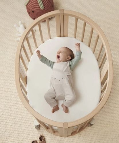 Stokke Sleepi Mini V3 - owalne łóżeczko dla dziecka
